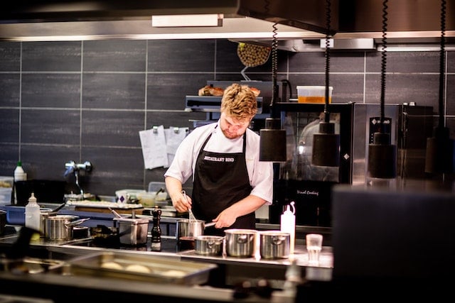 Picture of a barista working in a coffee store