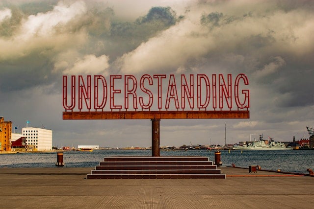 A picture of a sign with the word "Understanding"