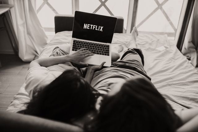 A couple watching Turkish content on Netflix in bed